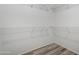 The walk-in closet is a blank canvas with wire shelving ready for your custom organization at 16476 W Limestone Dr, Surprise, AZ 85374