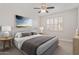 Comfortable bedroom with neutral tones, plantation shutters, and ample natural light at 17816 W Mariposa Dr, Surprise, AZ 85374