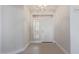 Bright foyer features a transom window and sidelight window, and a white door at 17816 W Mariposa Dr, Surprise, AZ 85374