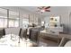 Bright and airy living room with large windows, neutral decor, and stylish furnishings at 17816 W Mariposa Dr, Surprise, AZ 85374