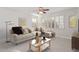 Inviting living room features a plush sectional sofa and a decorative coffee table at 17816 W Mariposa Dr, Surprise, AZ 85374