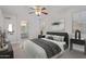 Serene main bedroom with an ensuite bathroom and ample natural light at 17816 W Mariposa Dr, Surprise, AZ 85374