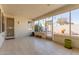 Covered patio with tile flooring and screens at 17816 W Mariposa Dr, Surprise, AZ 85374