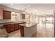 Open kitchen with granite countertops, stainless steel appliances and ample cabinet space at 18060 W Rimrock St, Surprise, AZ 85388