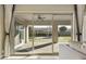Bright backyard view with a covered patio through sliding glass doors at 19235 E Peartree Ln, Queen Creek, AZ 85142