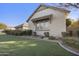 Beautifully landscaped yard with a view of the exterior of the home at 19235 E Peartree Ln, Queen Creek, AZ 85142