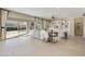 Expansive living room with a large sliding glass door leading to the outdoor space at 19235 E Peartree Ln, Queen Creek, AZ 85142