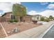 Single-story home displaying a well-kept yard, desert landscaping and attached two-car garage at 20529 N 94Th Ln, Peoria, AZ 85382