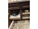 Custom cabinets featuring pull-out drawers and organizers for storing cookware in the kitchen at 20529 N 94Th Ln, Peoria, AZ 85382