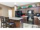 Beautiful kitchen with ample storage, tile floors and black appliances at 20529 N 94Th Ln, Peoria, AZ 85382