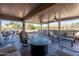 Spacious covered patio with comfortable seating and desert landscaping at 21730 N Black Bear Lodge Dr, Surprise, AZ 85387