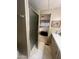 Bathroom showcasing a shower enclosure and an open doorway leading into the bedroom area at 2207 N Shannon Way, Mesa, AZ 85215