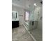 Modern bathroom featuring a walk in shower, tub, and vanity at 2212 W Alicia Dr, Phoenix, AZ 85041