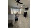 Cozy bedroom featuring plenty of natural light and comfortable seating at 2212 W Alicia Dr, Phoenix, AZ 85041