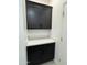 Functional laundry room with modern cabinetry and a pristine countertop space at 2212 W Alicia Dr, Phoenix, AZ 85041