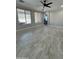Living room with large windows and neutral tile flooring at 2212 W Alicia Dr, Phoenix, AZ 85041