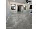 Spacious living room featuring arches, tile floors, and neutral decor at 2212 W Alicia Dr, Phoenix, AZ 85041