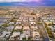A picturesque neighborhood featuring well-manicured lawns, mature trees, and luxurious homes, from an aerial perspective at 2656 E Oriole Dr, Gilbert, AZ 85297