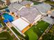 This aerial view of the property shows a pool, putting green, and multiple outdoor living spaces at 2656 E Oriole Dr, Gilbert, AZ 85297