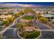 Scenic aerial perspective of a neighborhood with mature trees, green spaces, and well-maintained homes at 2656 E Oriole Dr, Gilbert, AZ 85297