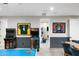 Spacious basement game room with an entertainment area and table tennis at 2656 E Oriole Dr, Gilbert, AZ 85297