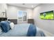 Bright, airy bedroom with large windows and two dressers at 2656 E Oriole Dr, Gilbert, AZ 85297