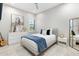 Bedroom with an airy feel, thanks to the neutral color palette and a large window at 2656 E Oriole Dr, Gilbert, AZ 85297