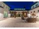 Inviting courtyard with firepit, comfortable seating, and ambient lighting at 2656 E Oriole Dr, Gilbert, AZ 85297