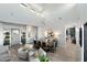Elegant dining room with high ceilings, modern light fixture, and stylish decor at 2656 E Oriole Dr, Gilbert, AZ 85297