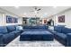 Spacious game room features comfortable sectional sofa, bar area, and games at 2656 E Oriole Dr, Gilbert, AZ 85297