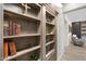 Hallway with custom-built bookshelves at 2656 E Oriole Dr, Gilbert, AZ 85297