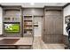 Well-designed home office with entertainment features offering a blend of productivity and relaxation at 2656 E Oriole Dr, Gilbert, AZ 85297