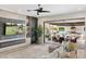 Bright living room with large sliding doors opening to the outdoor living area at 2656 E Oriole Dr, Gilbert, AZ 85297