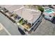Aerial view of a property showcasing backyard, patios, desert landscaping and manicured shrubs at 320 S 70Th St # 54, Mesa, AZ 85208