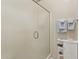 Bathroom with glass enclosed shower, storage cabinet and towel rack at 320 S 70Th St # 54, Mesa, AZ 85208