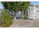 Close up of front yard with mature tree and bushes at 320 S 70Th St # 54, Mesa, AZ 85208