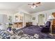 Open-concept living room with view into kitchen, breakfast bar and dining area at 320 S 70Th St # 54, Mesa, AZ 85208
