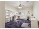 Spacious office with a ceiling fan, a large window, and plush carpeting at 320 S 70Th St # 54, Mesa, AZ 85208