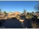 This backyard features desert landscaping with a fence view of the neighborhood at 3229 S 93Rd Ave, Tolleson, AZ 85353