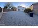 This backyard features a desert landscaping at 3229 S 93Rd Ave, Tolleson, AZ 85353