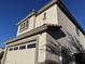 A view of the corner of the home showing the garage and the house number at 3229 S 93Rd Ave, Tolleson, AZ 85353
