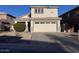 Home exterior showing the two-car garage, driveway, and small front yard at 3229 S 93Rd Ave, Tolleson, AZ 85353