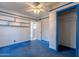 Bedroom featuring built-in shelves, blue carpeting, and a view through the doorway at 335 W Cambridge Ave, Phoenix, AZ 85003