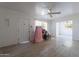 Bright living room with wood-look floors and ceiling fan at 335 W Cambridge Ave, Phoenix, AZ 85003