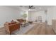 Cozy living room featuring comfortable seating and hardwood floors at 35344 N Karan Swiss Cir, San Tan Valley, AZ 85143