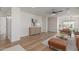 Bright living room featuring stylish furnishings and hardwood floors at 35344 N Karan Swiss Cir, San Tan Valley, AZ 85143