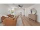 Bright living room featuring stylish furnishings and hardwood floors at 35344 N Karan Swiss Cir, San Tan Valley, AZ 85143