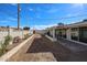 Back of home and backyard featuring desert landscaping and covered patio at 3716 W Griswold Rd, Phoenix, AZ 85051