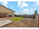Spacious backyard featuring turf and covered patio at 37292 N Yellowstone Dr, San Tan Valley, AZ 85140
