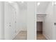 Bright hallway with closet and access to the garage at 37292 N Yellowstone Dr, San Tan Valley, AZ 85140
